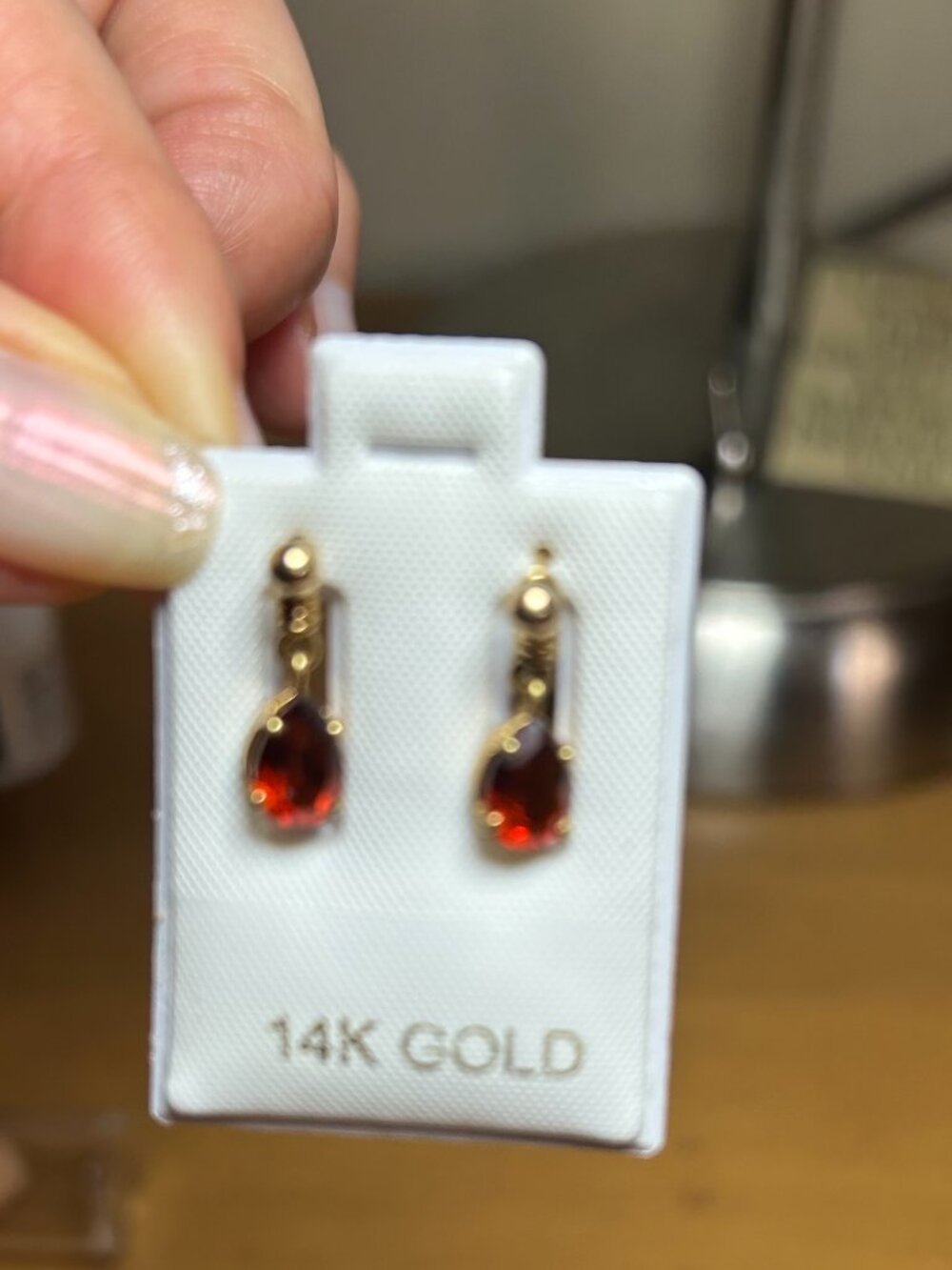 18k yellow gold 7x5mm Pear Shaped Brazilian Topaz paired with 10K studs earrings